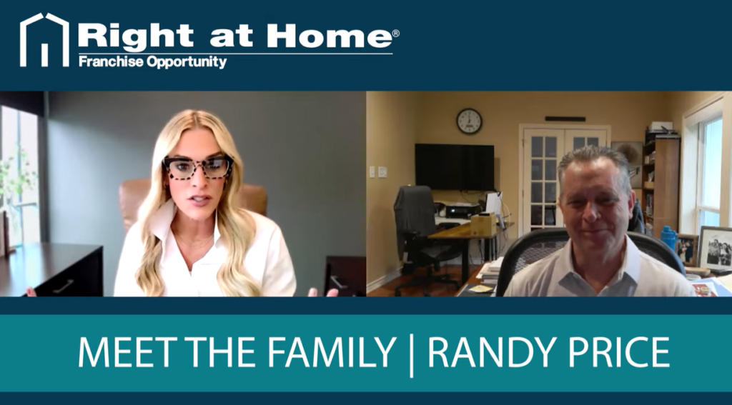 Two people smiling at the camera